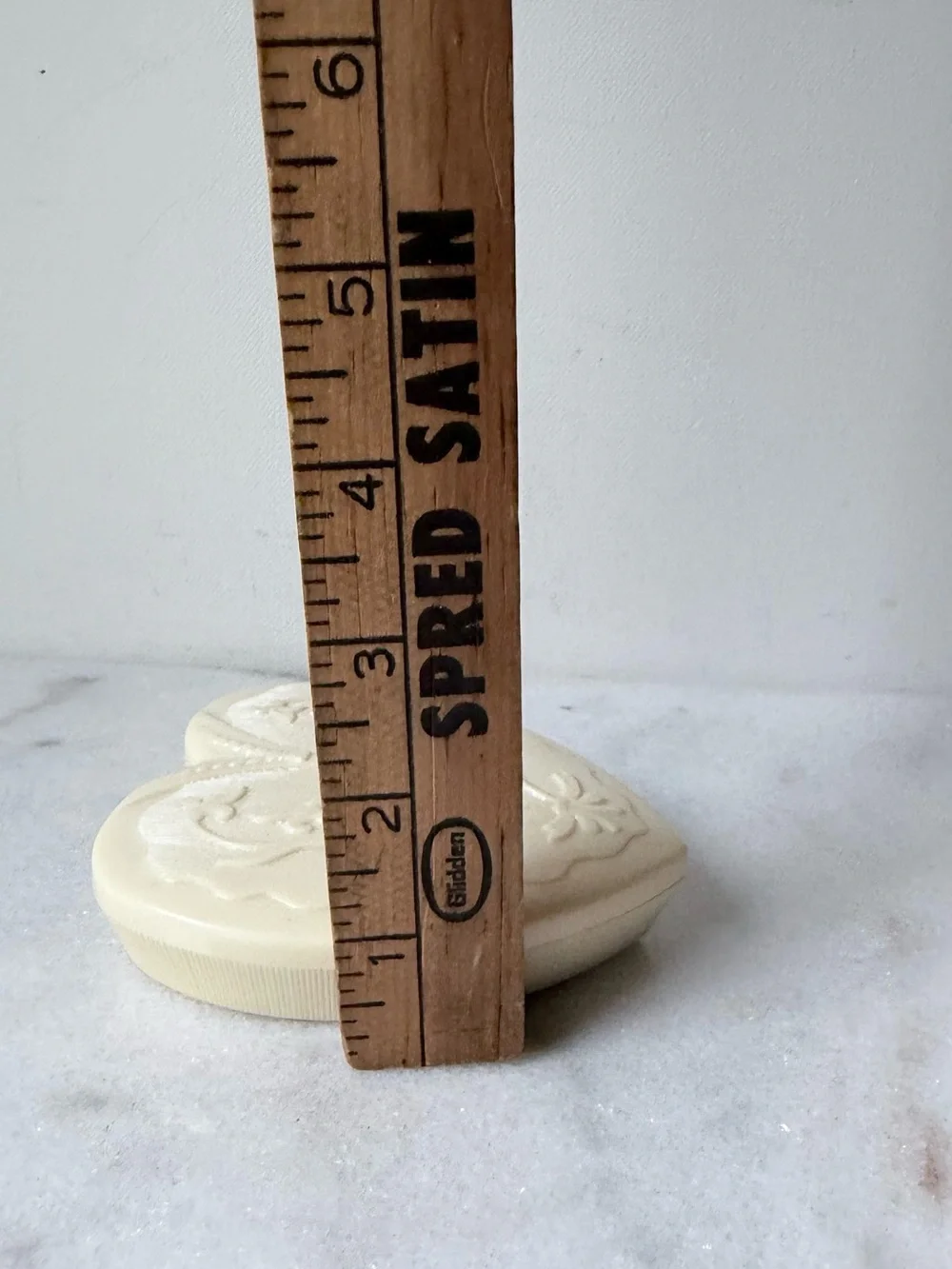 vintage Art Deco-style cream celluloid heart-shaped jewelry box